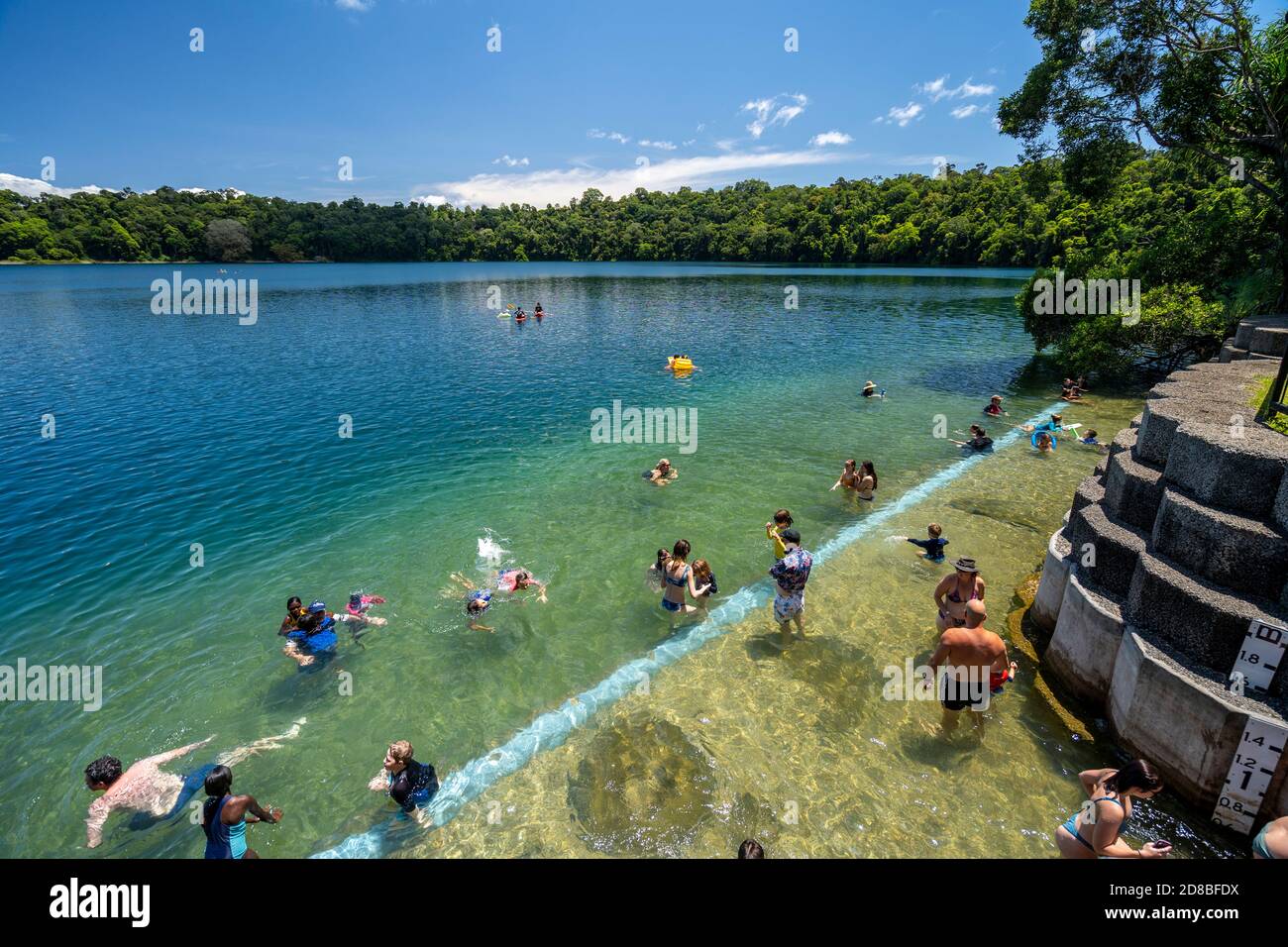 Swimmers at Lake Eacham, Atherton Tablelands, Crater Lakes National Park, North Queensland, Australia Stock Photo