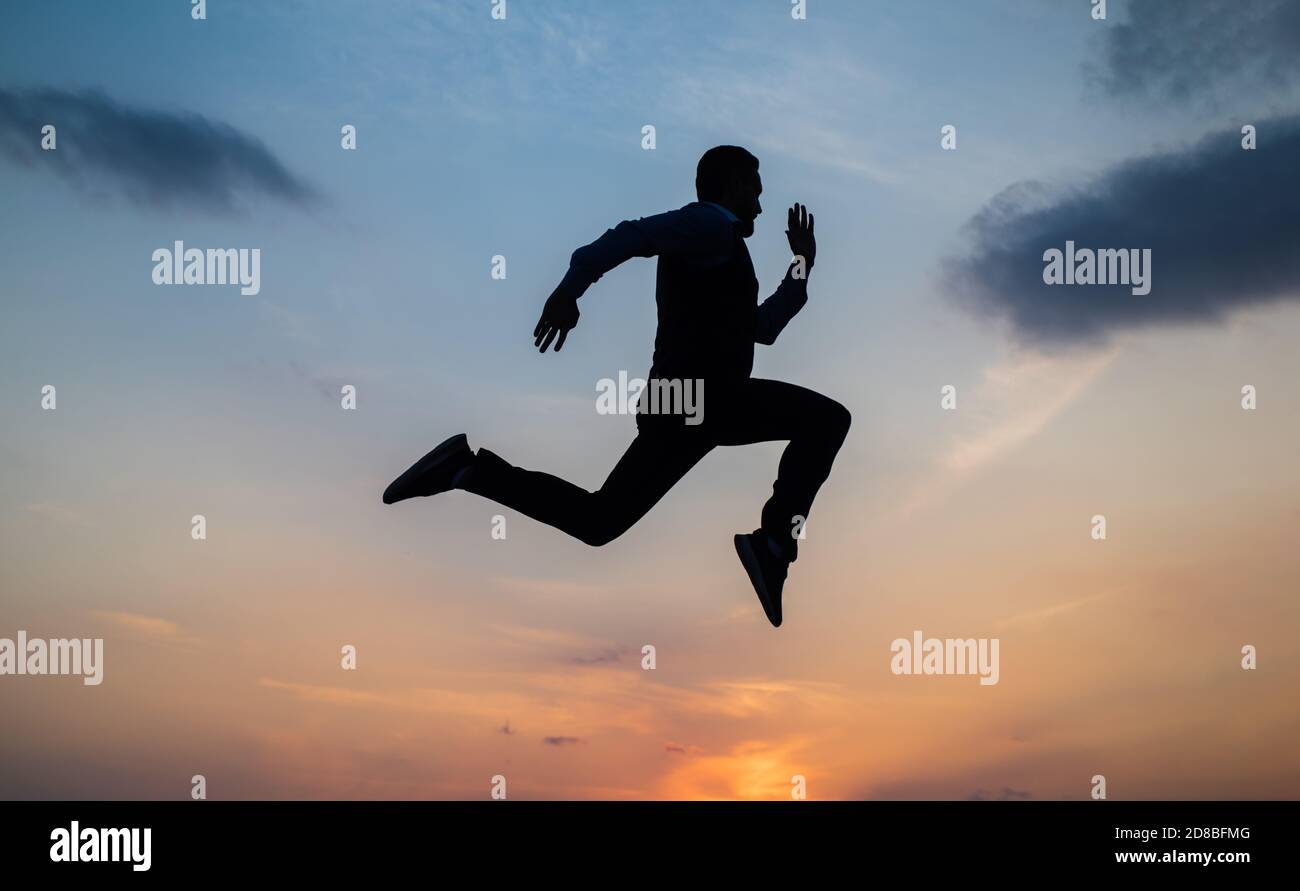 Find Your Freedom Personal Achievement Goal Man Silhouette Jump On Sky Background Confident Businessman Running Daily Motivation Enjoying Life And Nature Business Success Freedom Stock Photo Alamy