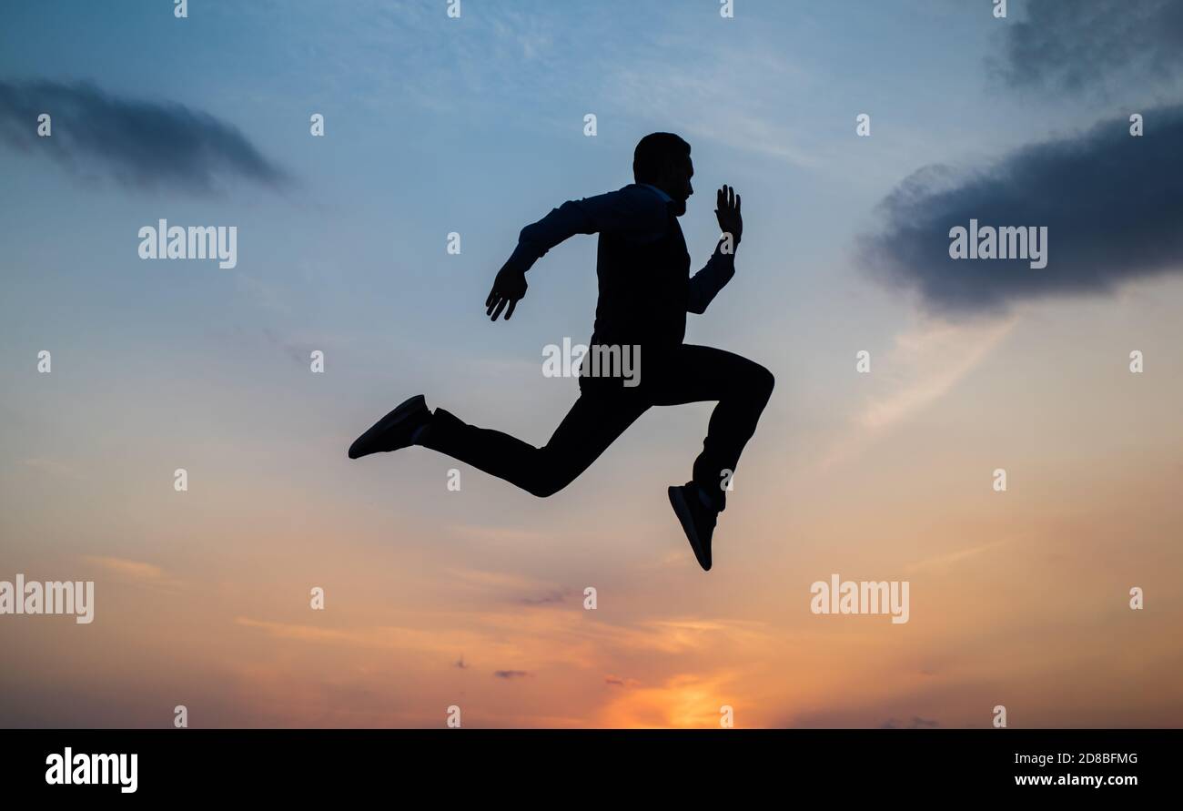 Find Your Freedom Personal Achievement Goal Man Silhouette Jump On Sky Background Confident Businessman Running Daily Motivation Enjoying Life And Nature Business Success Freedom Stock Photo Alamy Find Your Freedom Personal Achievement Goal Man Silhouette Jump On Sky Background Confident Businessman Running Daily Motivation Enjoying Life And Nature Business Success Freedom Stock Photo Alamy