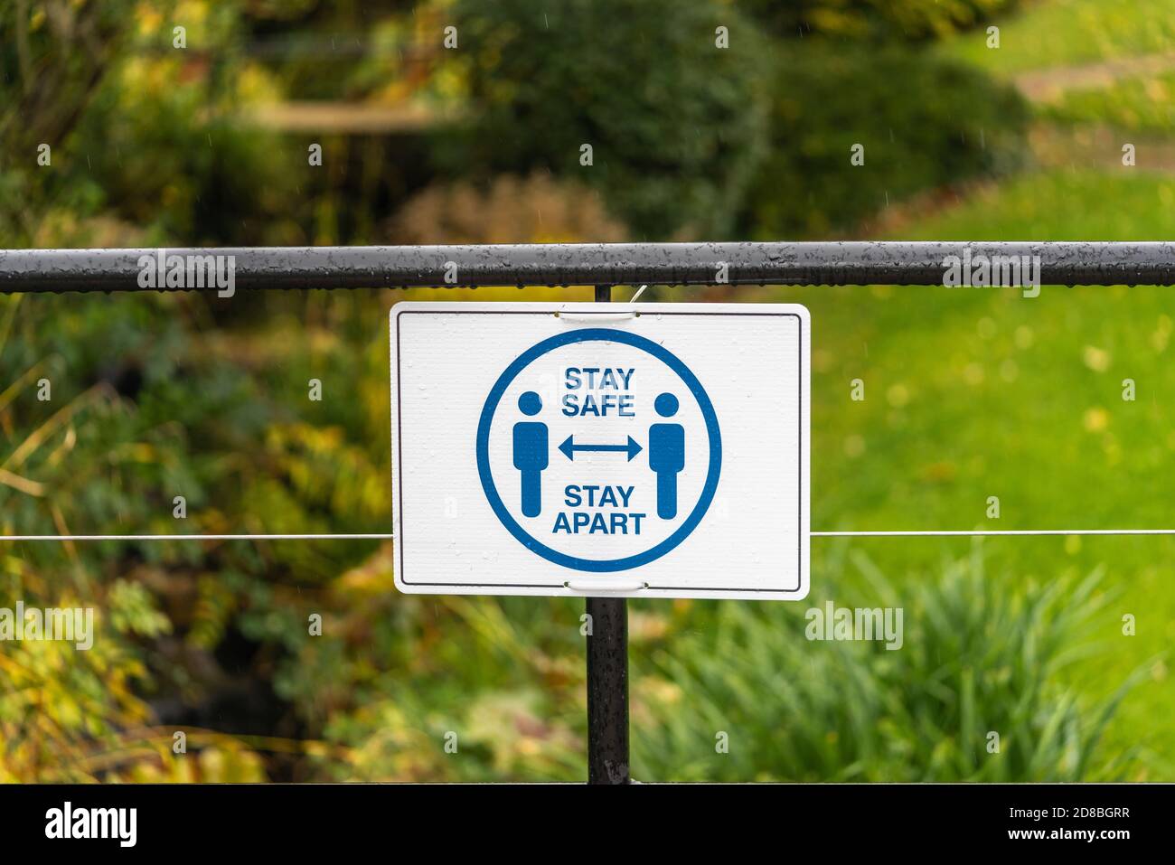 A 'Stay safe stay apart' sign on a rainy day -  Covid 19 social distancing measures at the University of Southampton October 2020, England, UK Stock Photo