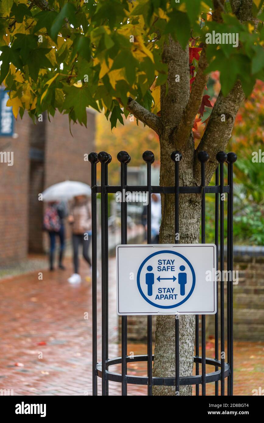 A 'Stay safe stay apart' sign on a rainy day -  Covid 19 social distancing measures at the University of Southampton October 2020, England, UK Stock Photo