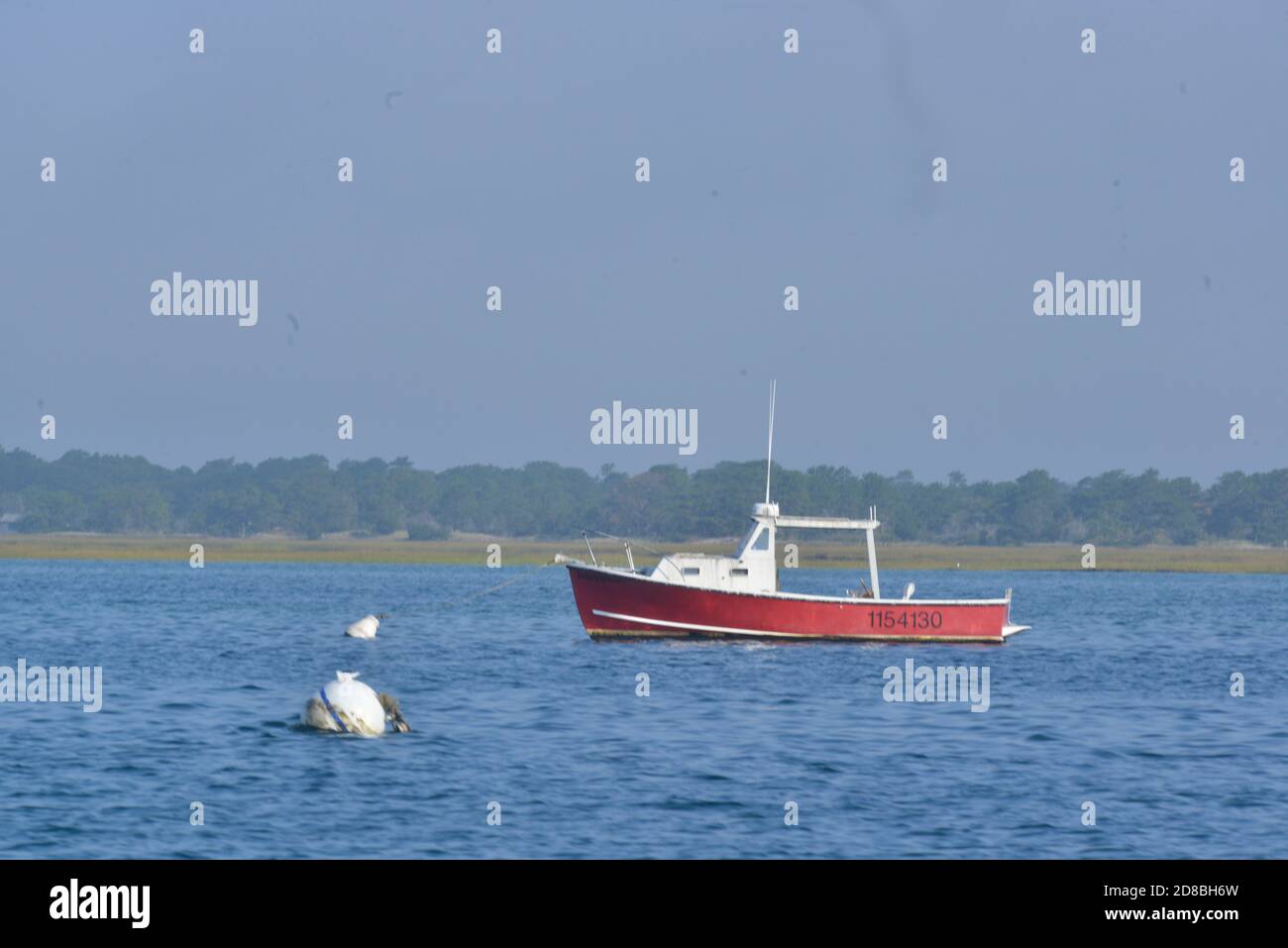 Barnstable, Massachusetts, USA. 25th Sep, 2020. Scenic Cape Cod with an antique lobster boat at Barnstable Harbor a popular tourist site during the Covid-19 Pandemic. Credit: Kenneth Martin/ZUMA Wire/Alamy Live News Stock Photo
