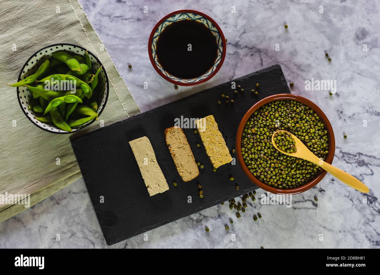 Top view of different products derived from soy. Edamame beans, soy