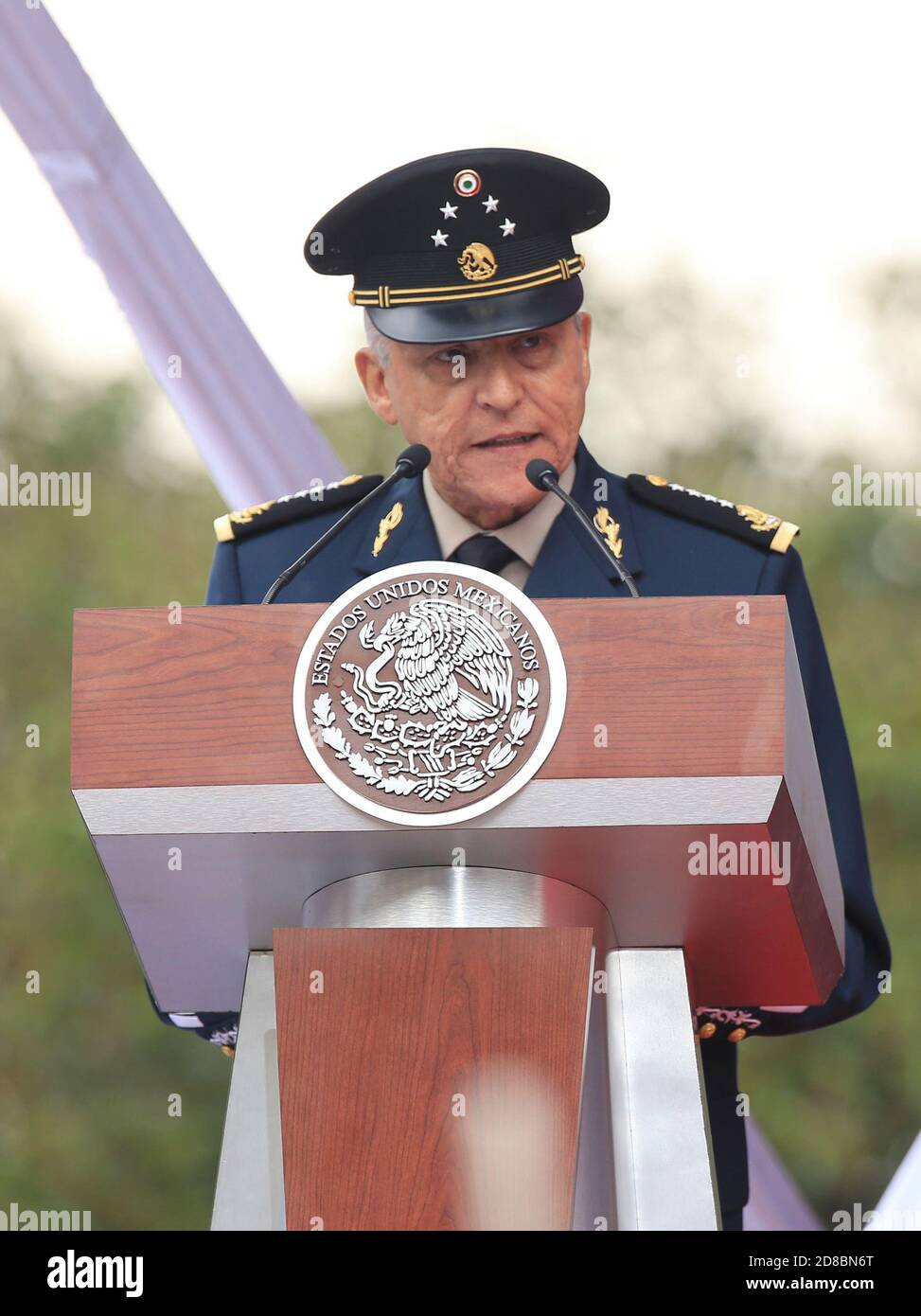 Mexican Defense Minister Gen. Salvador Cienfuegos Zepeda delivers an address during ceremony marking the 105th Anniversary of the Loyalty March February 9, 2018 in Mexico City, Mexico. Cienfuegos was arrested October 16, 2020 at Los Angeles International Airport and charged with drug-related corruption. Stock Photo