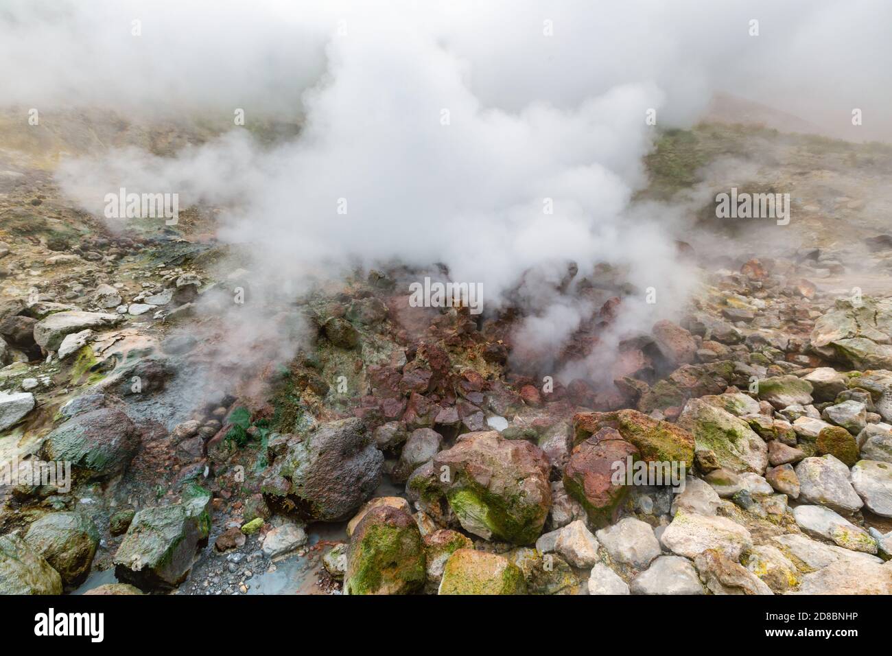 Picturesque view of volcanic landscape, aggressive hot spring, eruption ...