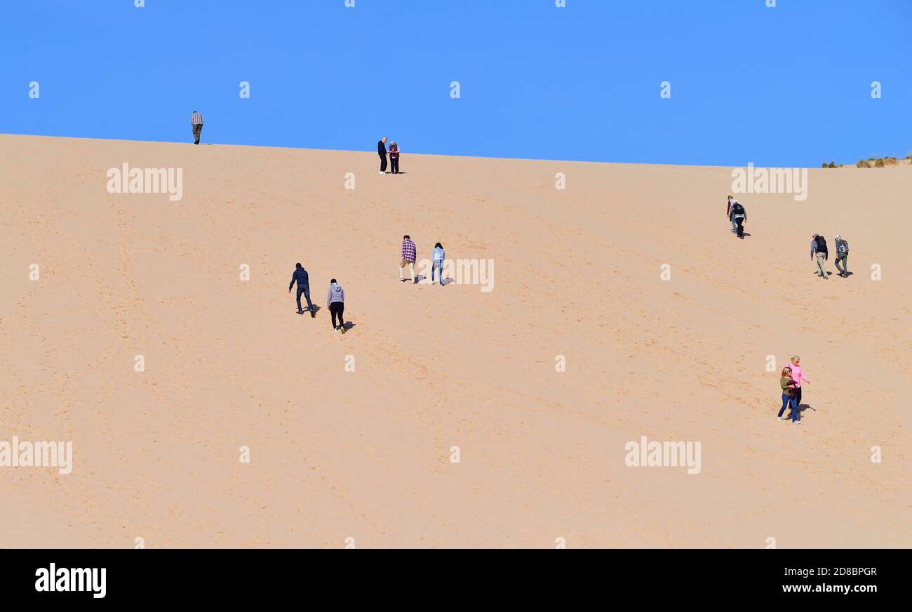 Empire, Michigan, USA. Dwarfed by the sheer size of the obstacle and