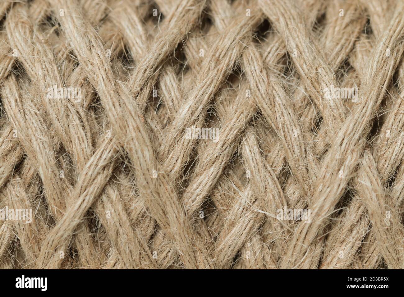 Closeup of a brown jute rope texture for background or wallpaper