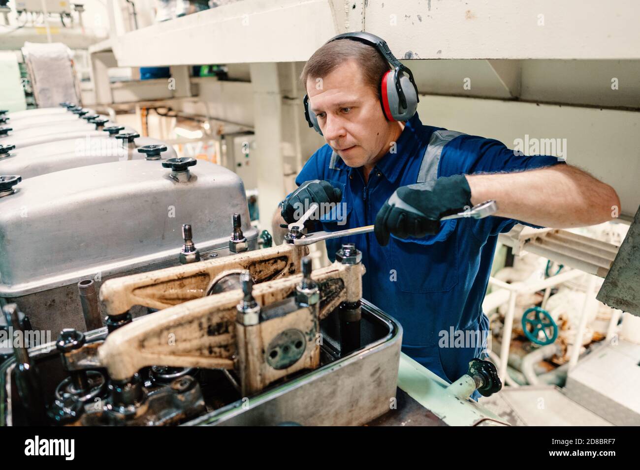 Marine engineer officer controlling vessel enginesand propulsion in ...
