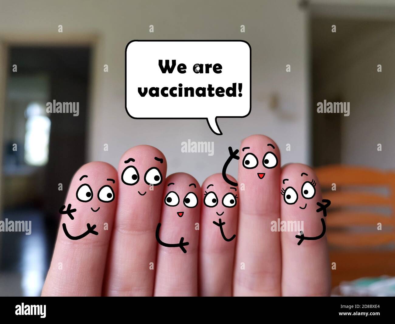 Six fingers are decorated as six person. They are all vaccinated. Stock Photo