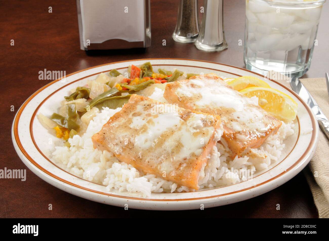Grilled salmon on a bed of rice Stock Photo Alamy