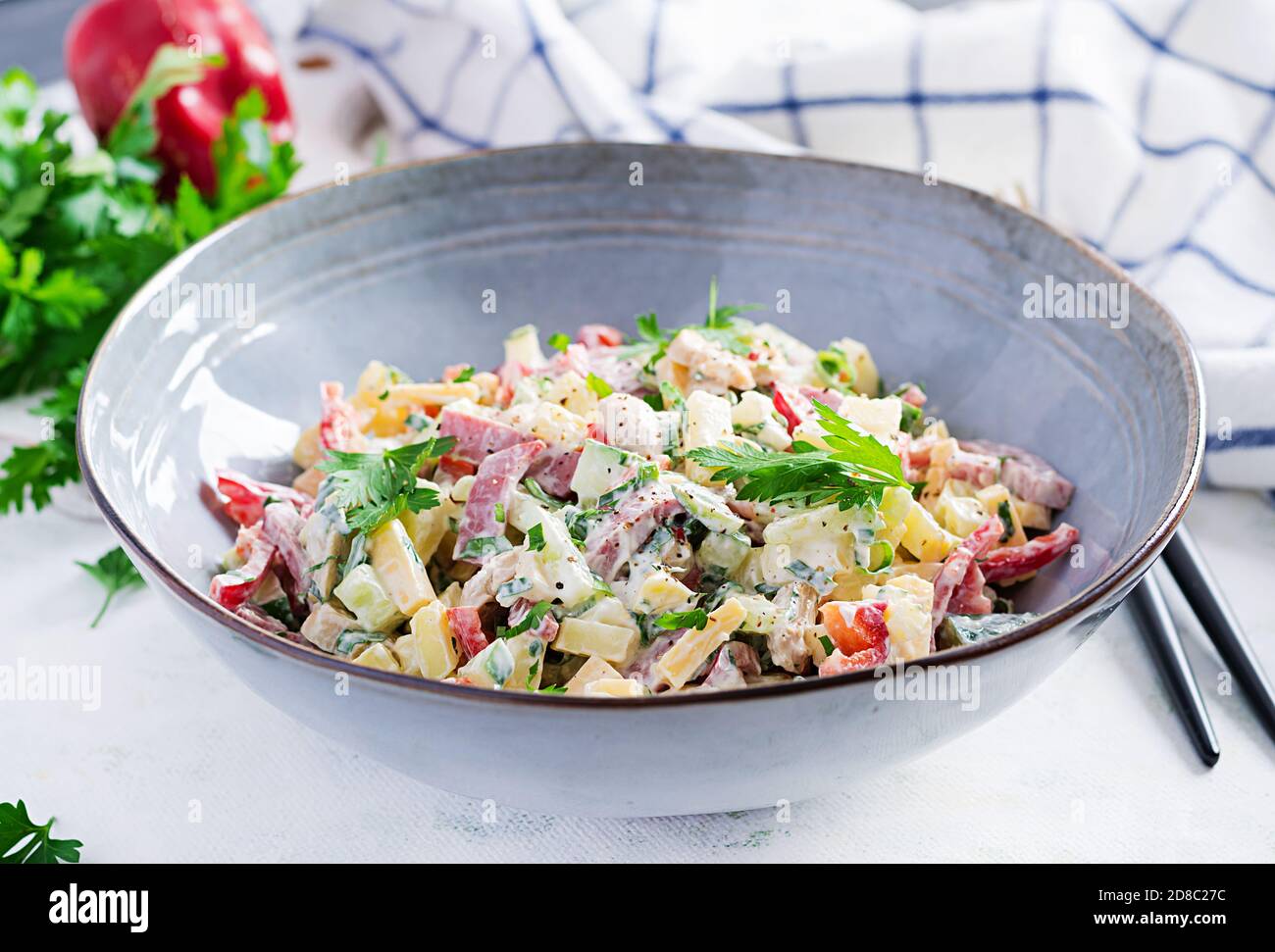 Trendy salad. Salad with ham, paprika, cucumber and cheese. Healthy