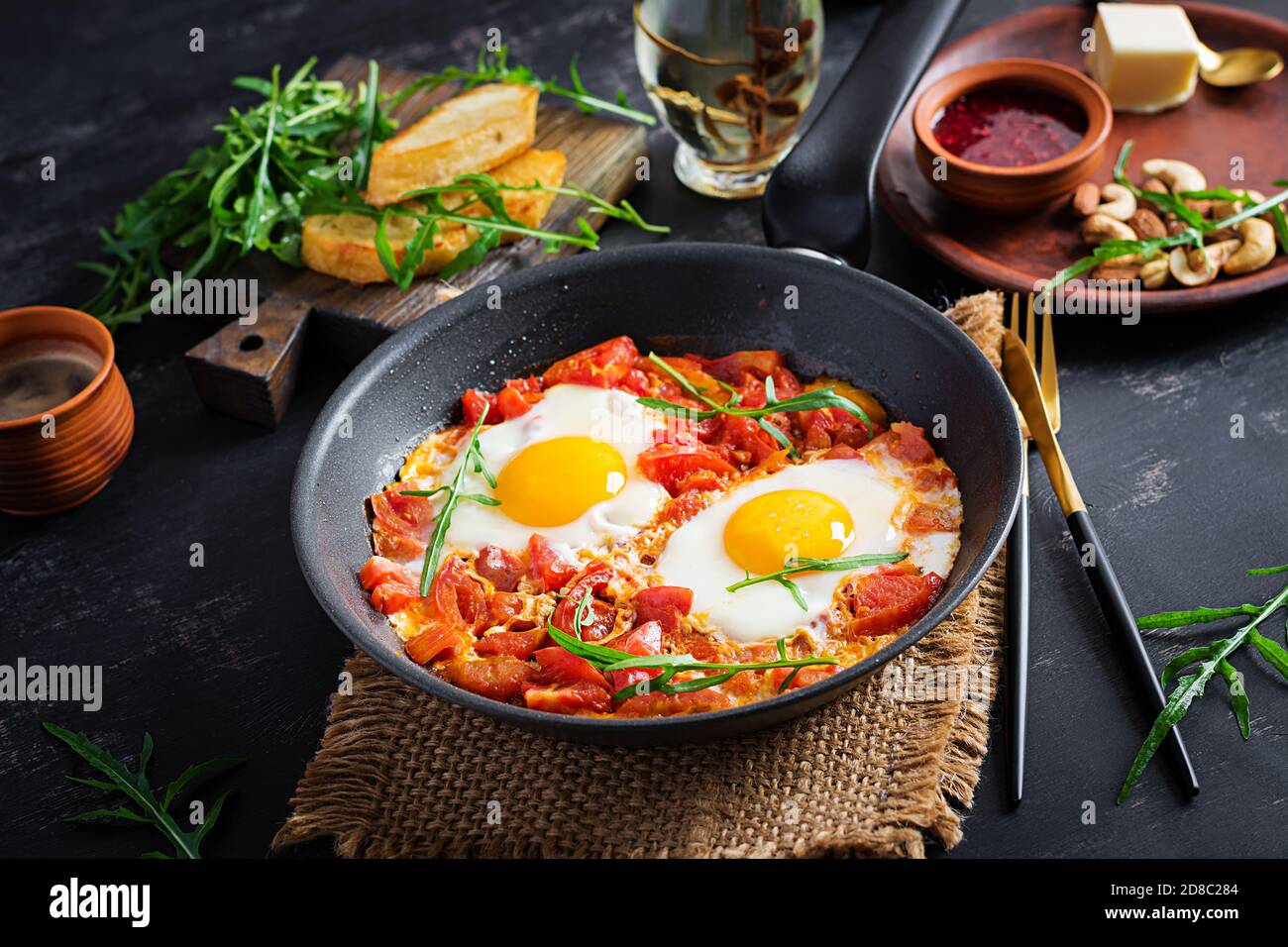 Late breakfast fried eggs with vegetables. Shakshuka. Arabic cuisine