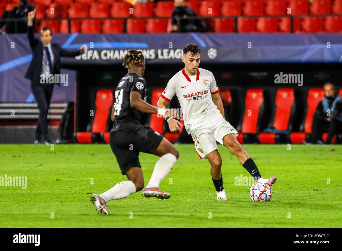 Munir El Haddadi of Sevilla and Brandon Soppy of Stade Rennais during the UEFA Champions League, Group Stage, Group E football match between Sevilla C Stock Photo