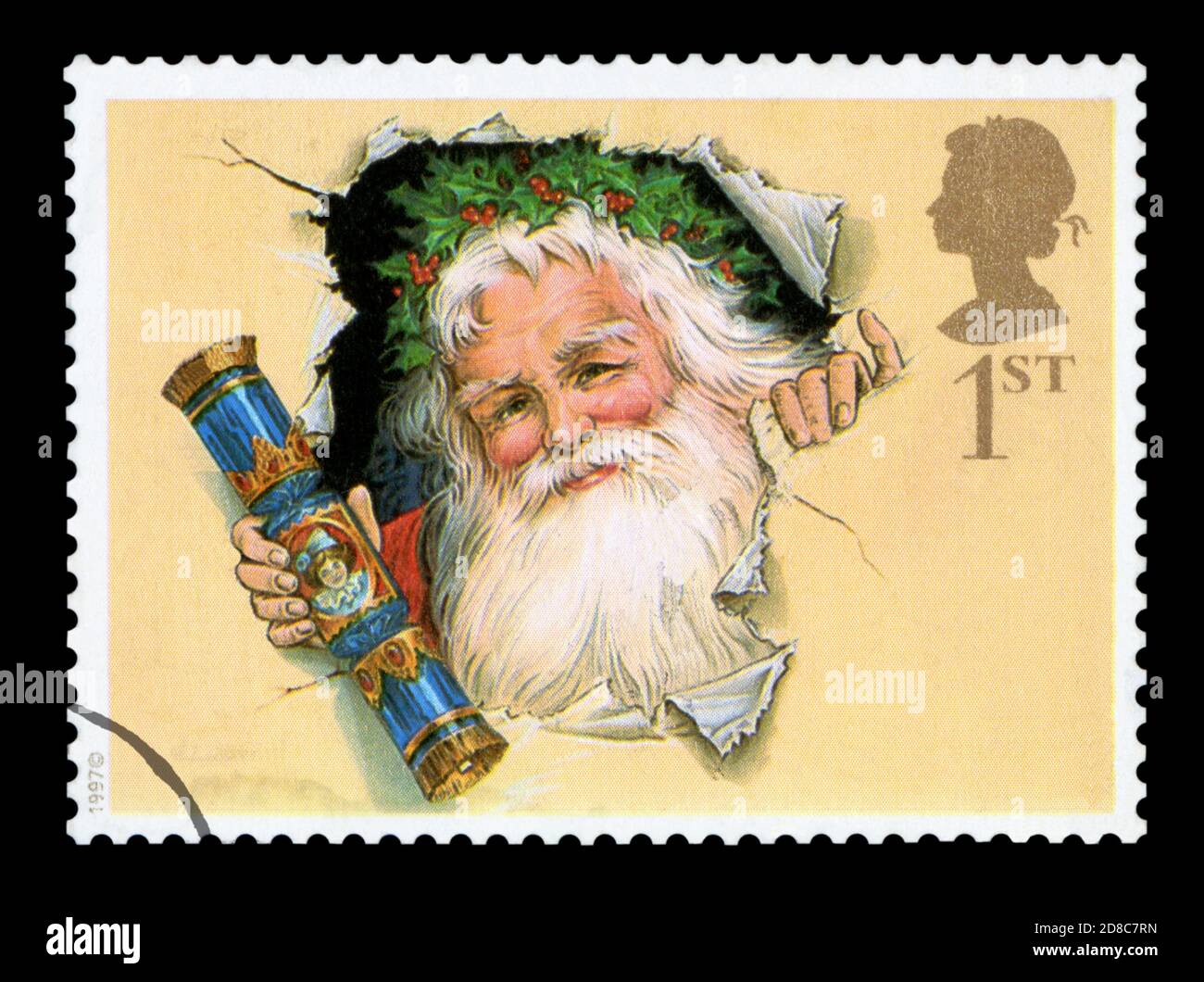 UNITED KINGDOM - CIRCA 1997: A stamp printed in England, shows Santa bursting through wrapping paper with cracker, circa 1997 Stock Photo