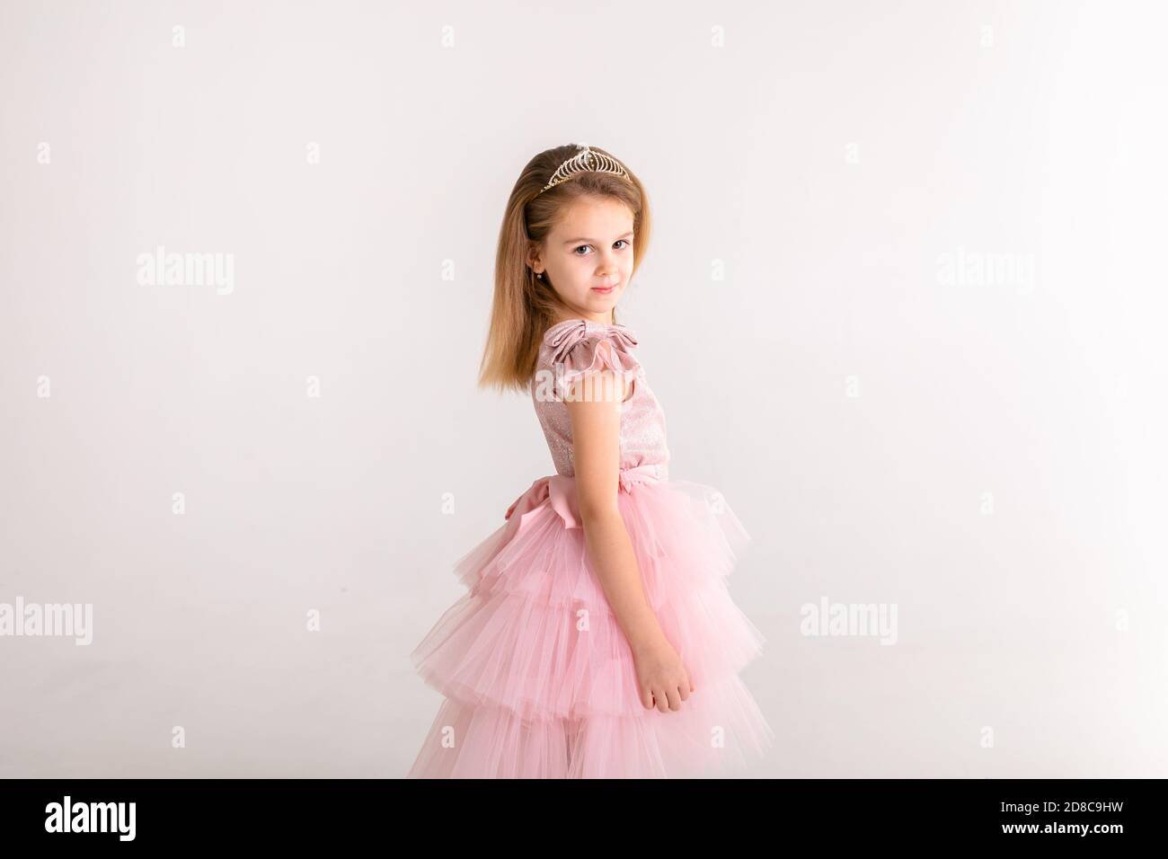 Beautiful little princess dancing in luxury dress Stock Photo - Alamy