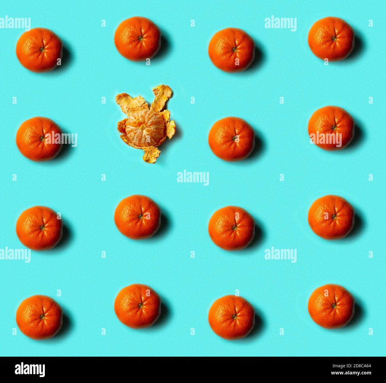 Seamless pattern of mandarin on blue background. Flat lay, top view. Stock Photo