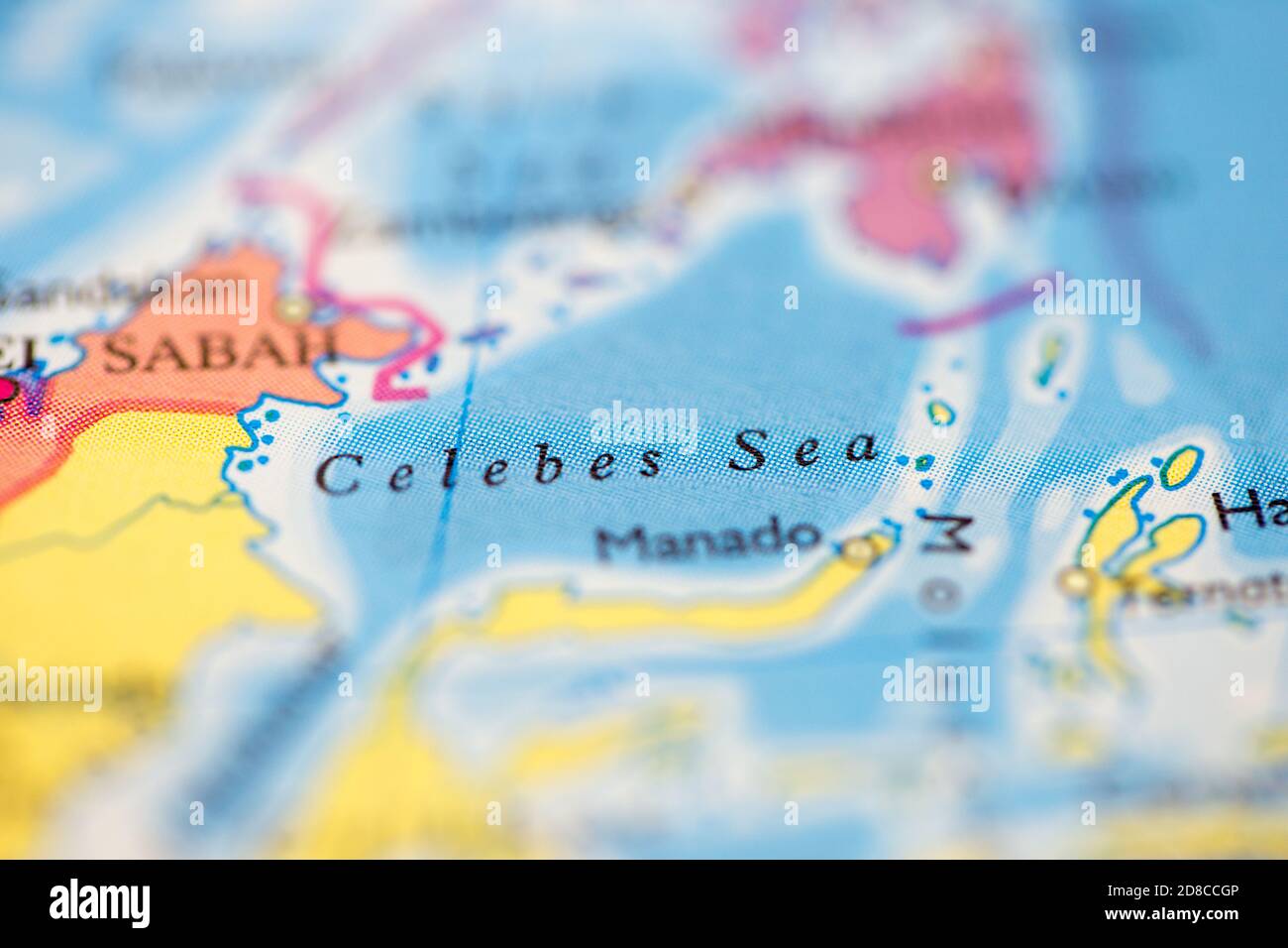 Shallow Depth Of Field Focus On Geographical Map Location Of Celebes Shallow Depth Of Field Focus On Geographical Map Location Of Celebes Sea Off Coast Of Indonesia On Atlas 2D8CCGP