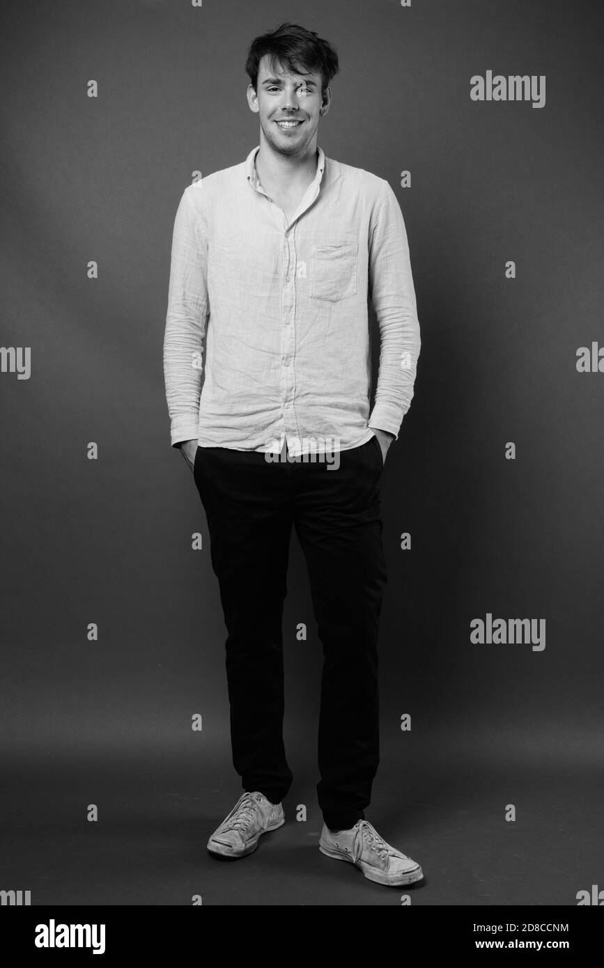 Full body shot happy young Black and White Stock Photos & Images - Alamy