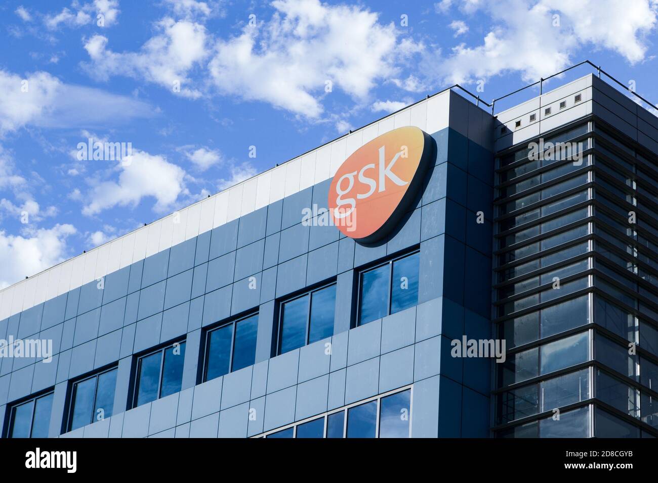 Poznan, Poland - October 28.2020: The Glaxosmithkline headquarters office building in Poznan. LOGO. GaxoSmithKline also called GSK is a British pharma Stock Photo