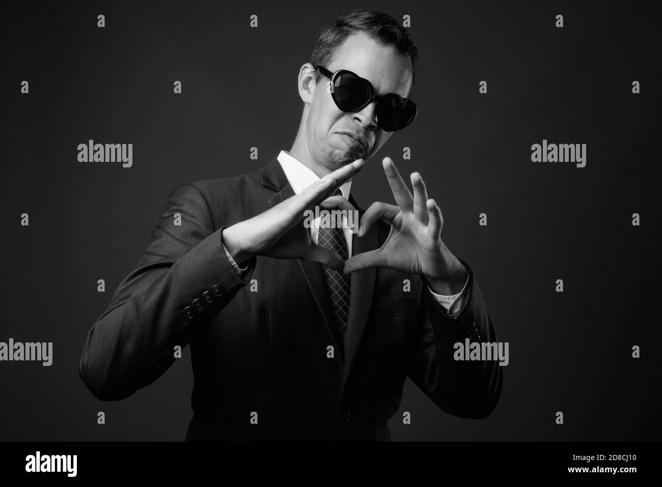 Studio shot of businessman against gray background Stock Photo