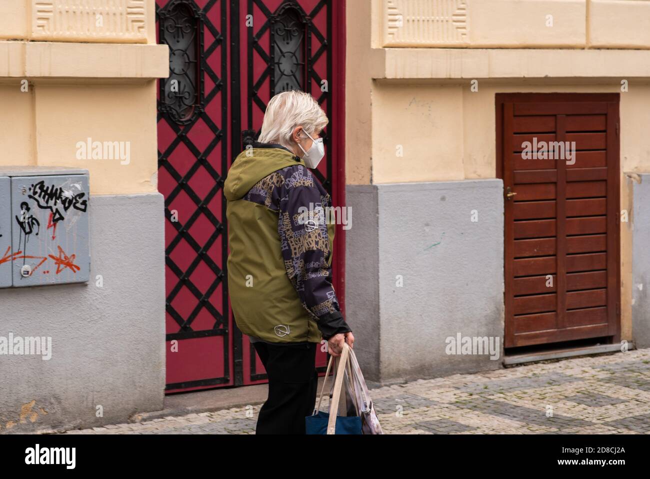 Old woman walking stick crossing hi-res stock photography and images ...