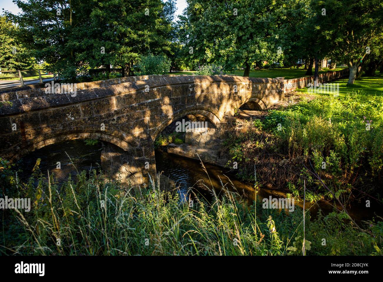 UK, England, Lincolnshire Wolds, West Rasen, 1400s packhorse bridge over River Rase Stock Photo