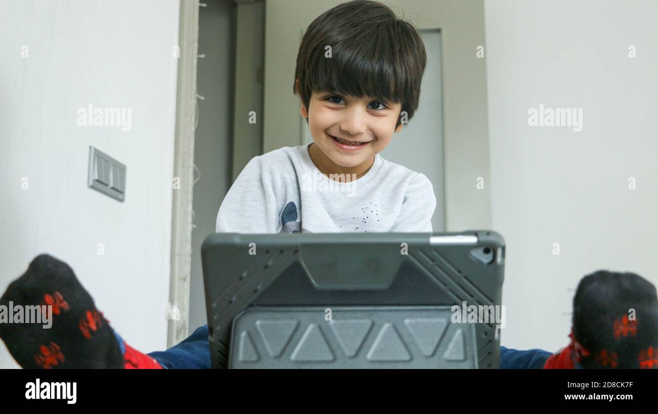 A child browsing on tablet Stock Photo Alamy