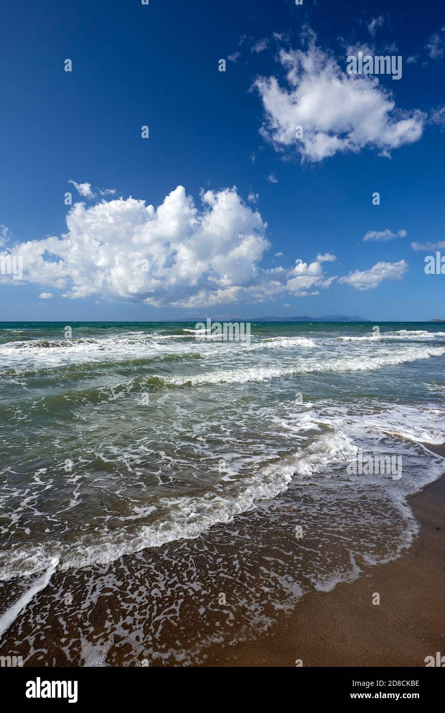 Torre Mozza (Li), Tuscany, Italy, waves on the shoreline of the beach Stock Photo