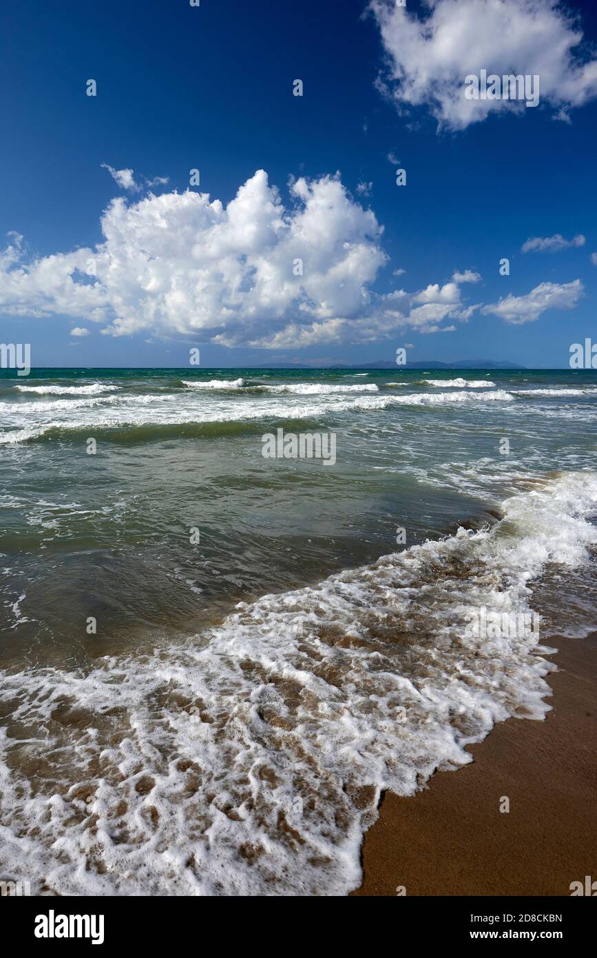 Torre Mozza (Li), Tuscany, Italy, waves on the shoreline of the beach Stock Photo