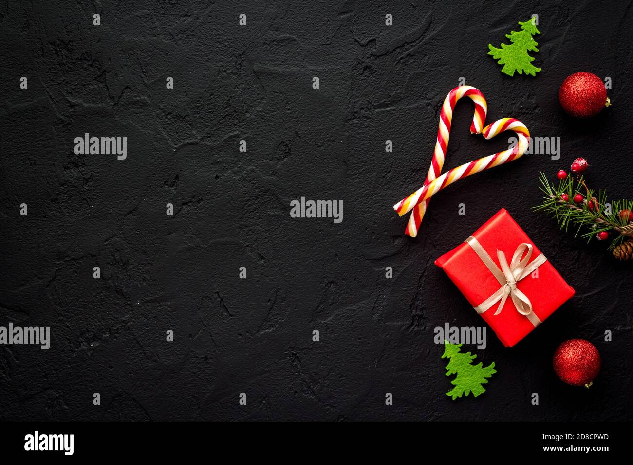 Christmas table layout with gifts and decorations Stock Photo - Alamy