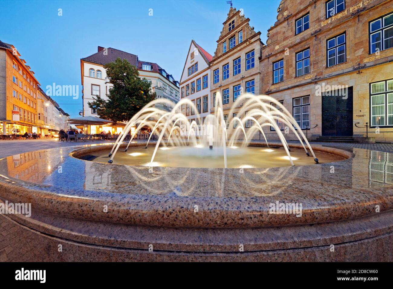 old market with fountain and historic houses in the evening, Germany, North Rhine-Westphalia, Bielefeld Stock Photo