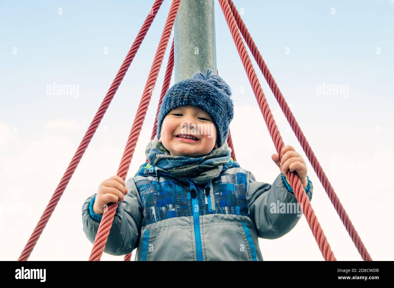 little boy playing at the playground Stock Photo - Alamy