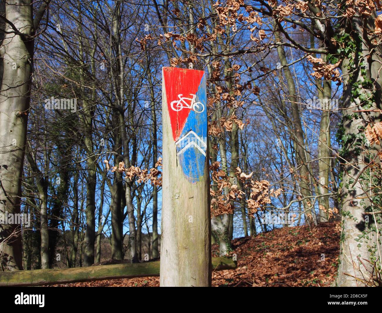 A sign post showing the route of a mountain bike cycle route Stock Photo