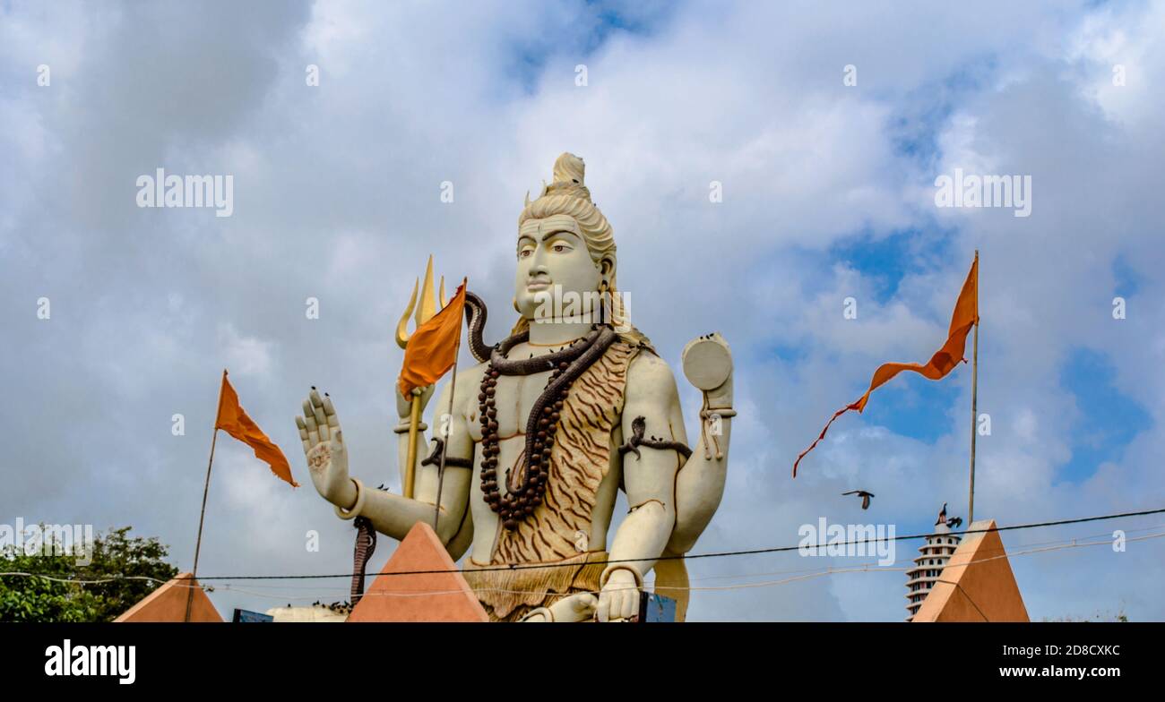 Big shiv statue. Nageshvara is one of the temples mentioned in the Shiva Purana and is one of the twelve Jyotirlingas. Stock Photo