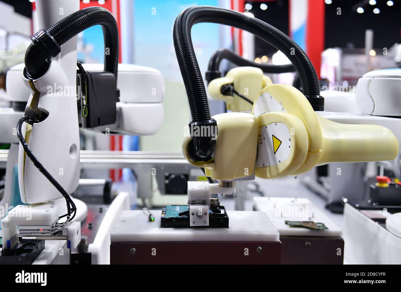 Industrial Robotic Arm for holding Electronic circuit board production in machinery and technology Stock Photo