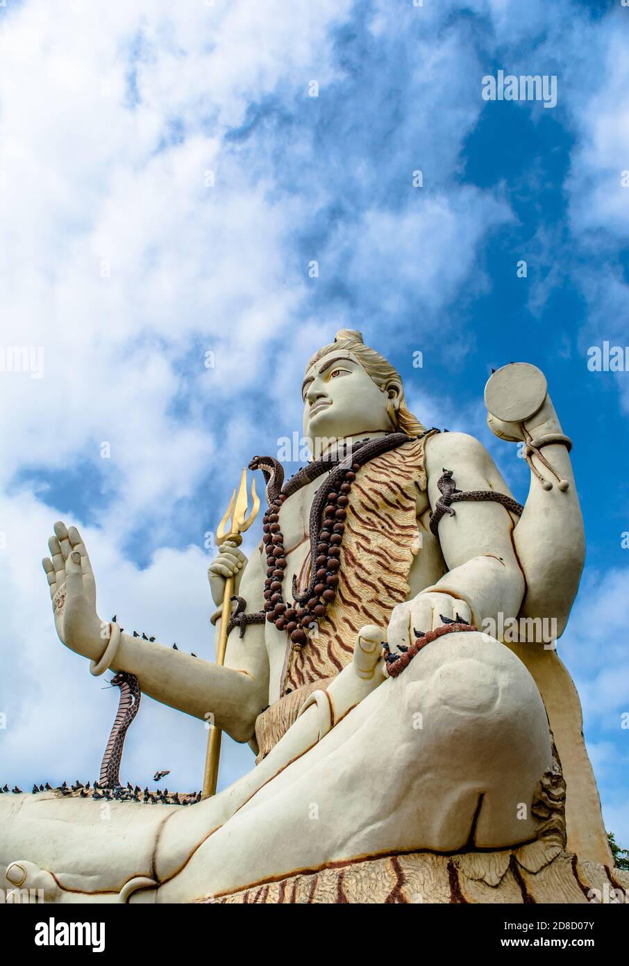 Big shiv statue. Nageshvara is one of the temples mentioned in the Shiva Purana and is one of the twelve Jyotirlingas. Stock Photo