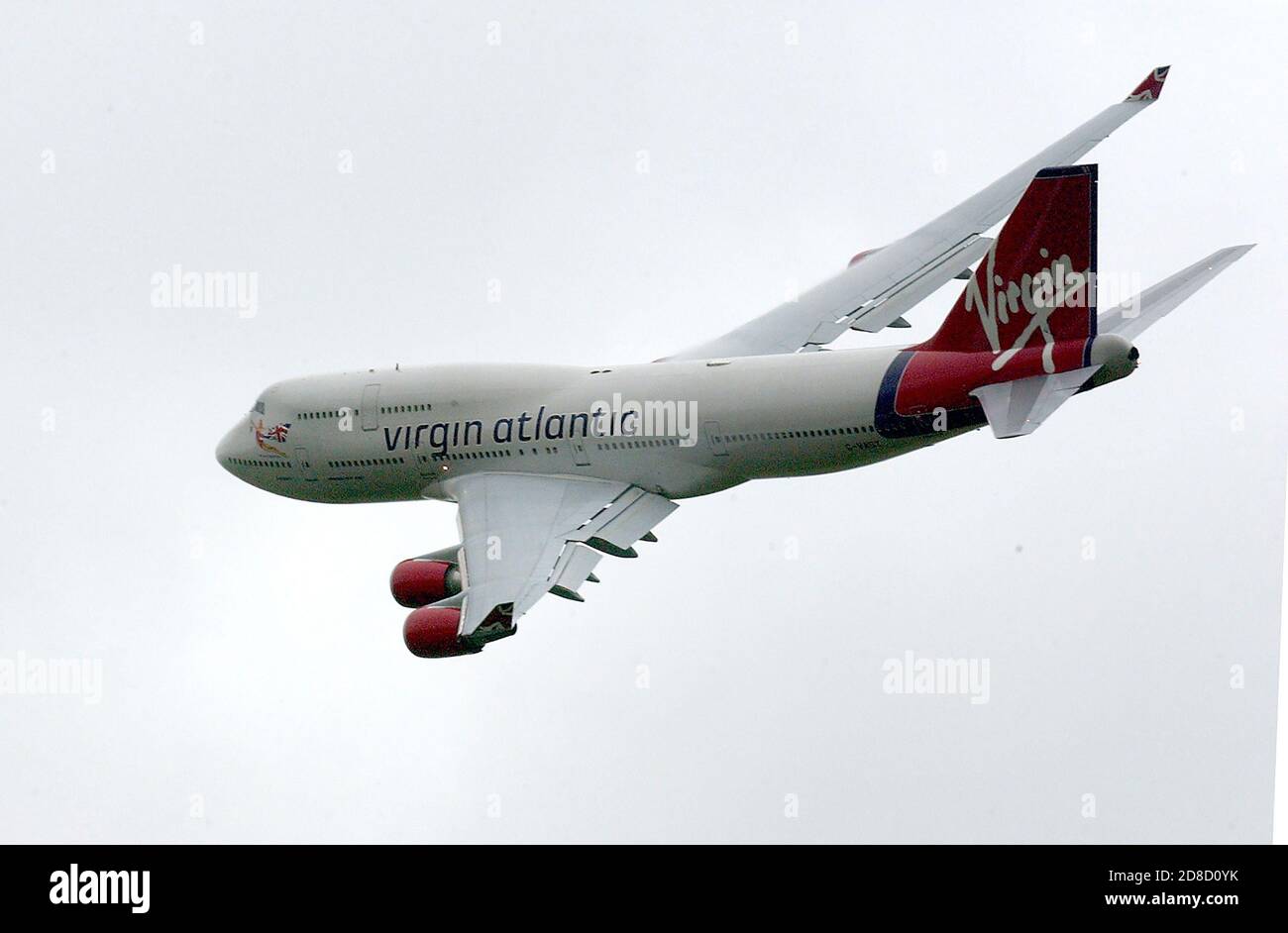 A Virgin Atlantic Boeing 747 (G-VAST) makes a low flypast before Richard Branson recreates the 1853 flight of Sir George Cayley's glider, in a replica Stock Photo