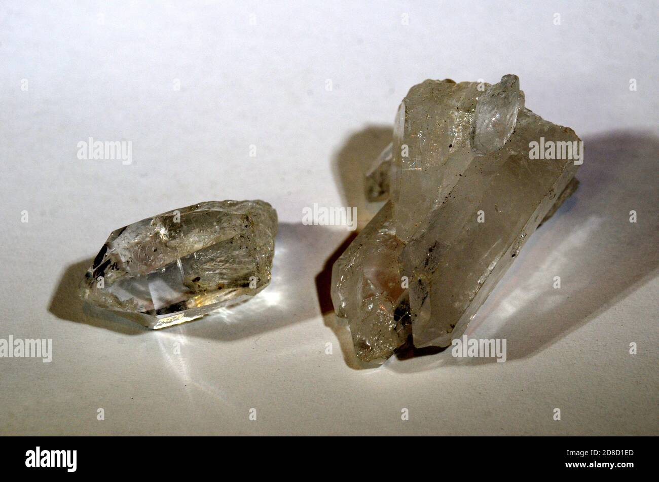 Two pieces of clear mountain crystal. Stock Photo