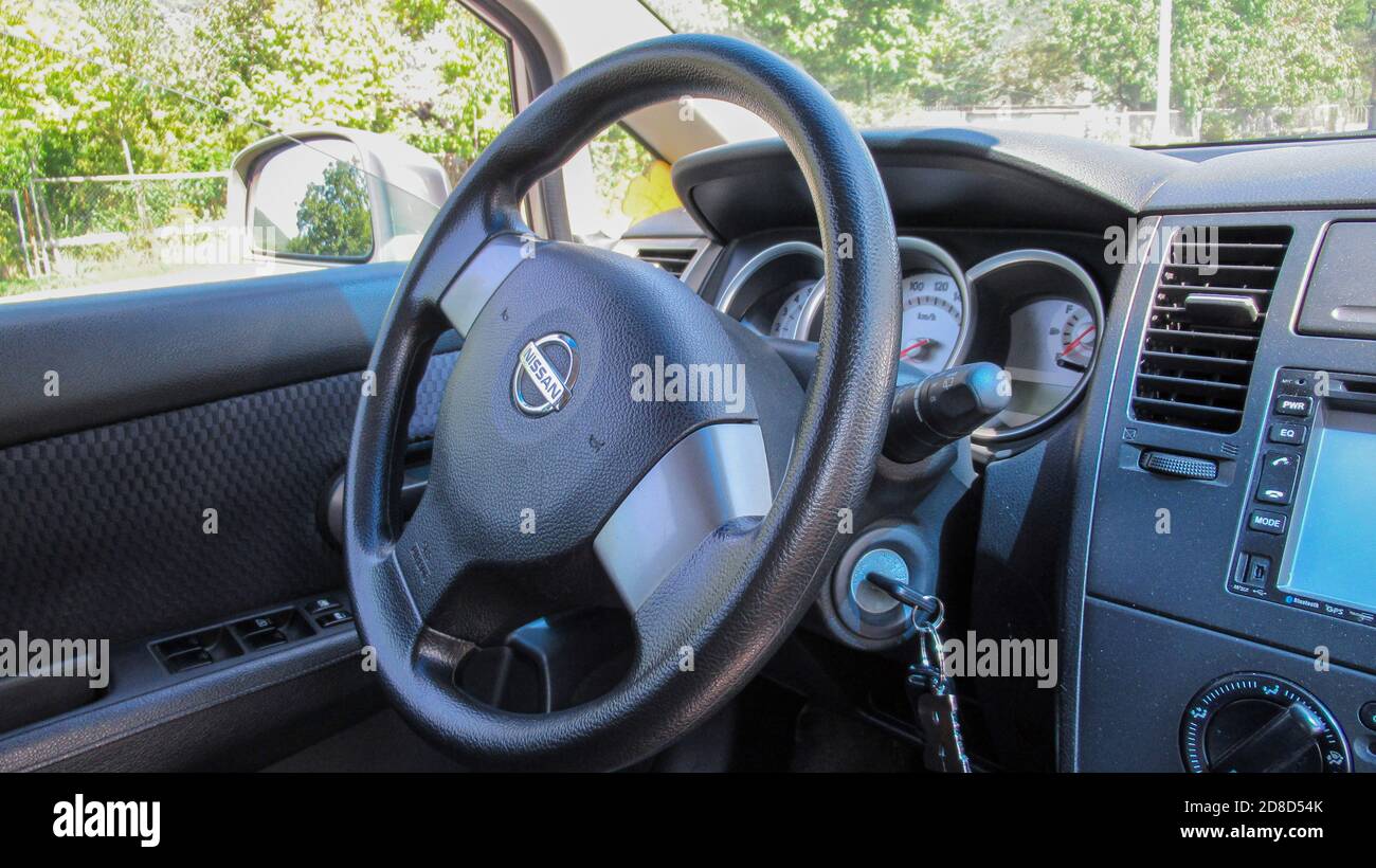 Baku, Azerbaijan, July 5 2020 : Nissan Tiida, Prestige car interior with  dashboard, steering wheel, speedometer and tachometer. Black leather  interior Stock Photo - Alamy