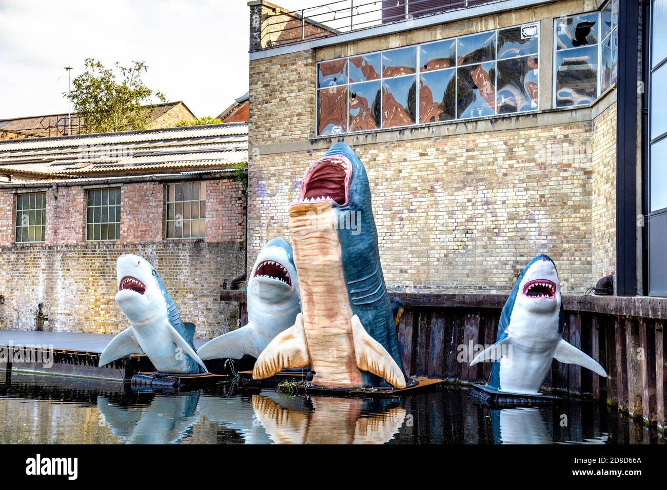 Fiberglass sharks, winners of the Architecture Foundation prize on Regents Canal in Haggerston, London, UK Stock Photo