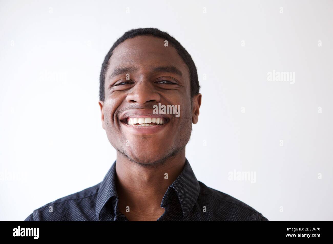 Close up horizontal portrait of young african american man smiling ...