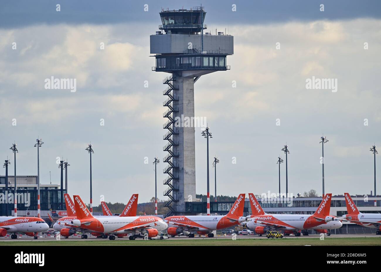 29 October 2020, Brandenburg, Schönefeld: Passenger aircraft of the British airline Easyjet are parked on the apron at Terminal 1 of the Capital Airport Berlin Brandenburg 'Willy Brandt' (BER). The opening of BER Airport is planned for 31.10.2020. Photo: Patrick Pleul/dpa-Zentralbild/dpa Stock Photo
