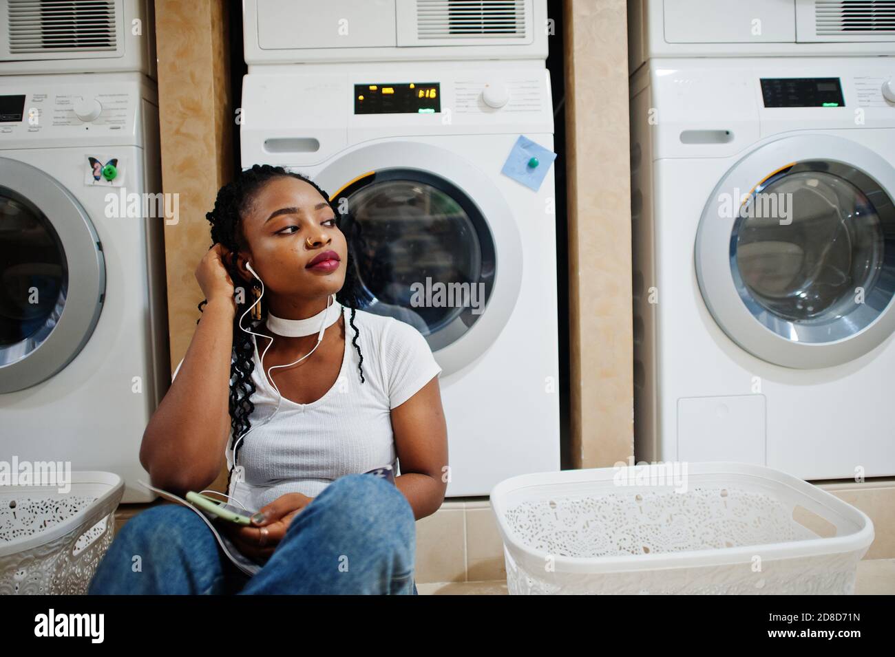 Cheerful african american woman sitting 