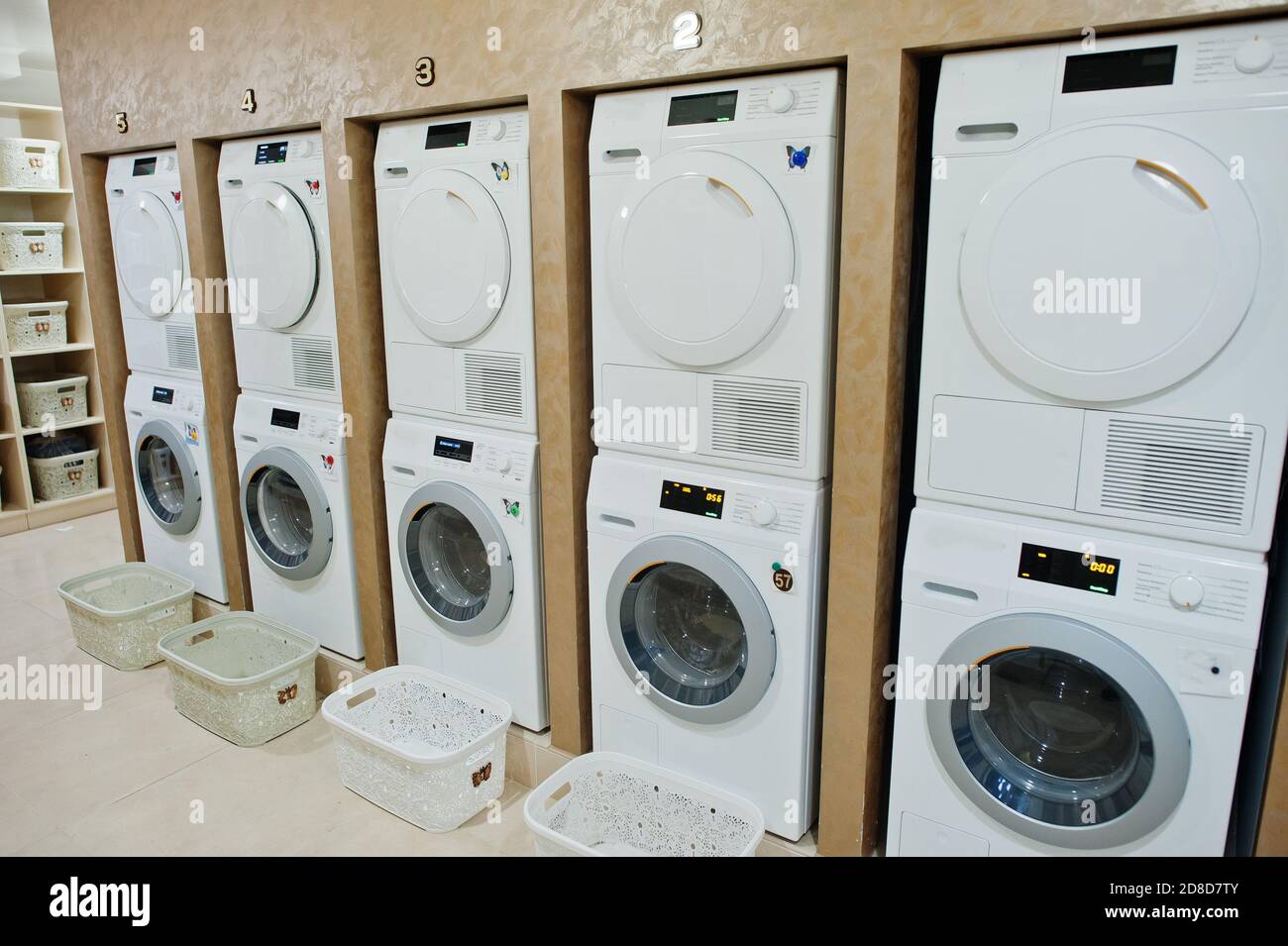 Washing machines in the self service laundry Stock Photo Alamy