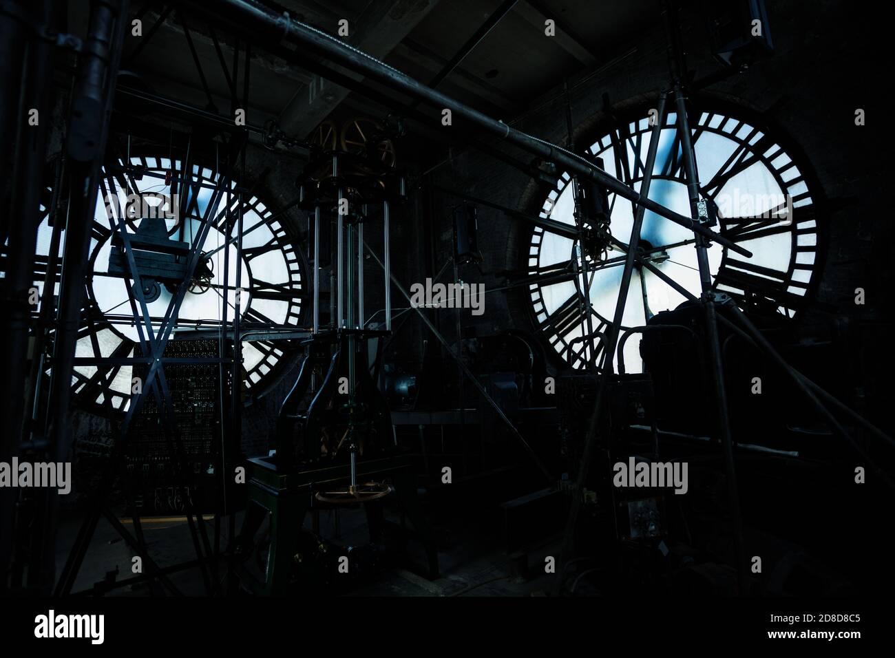 Clock Ray Building Interior of old big tower clock face mechanism inside brick space with ...