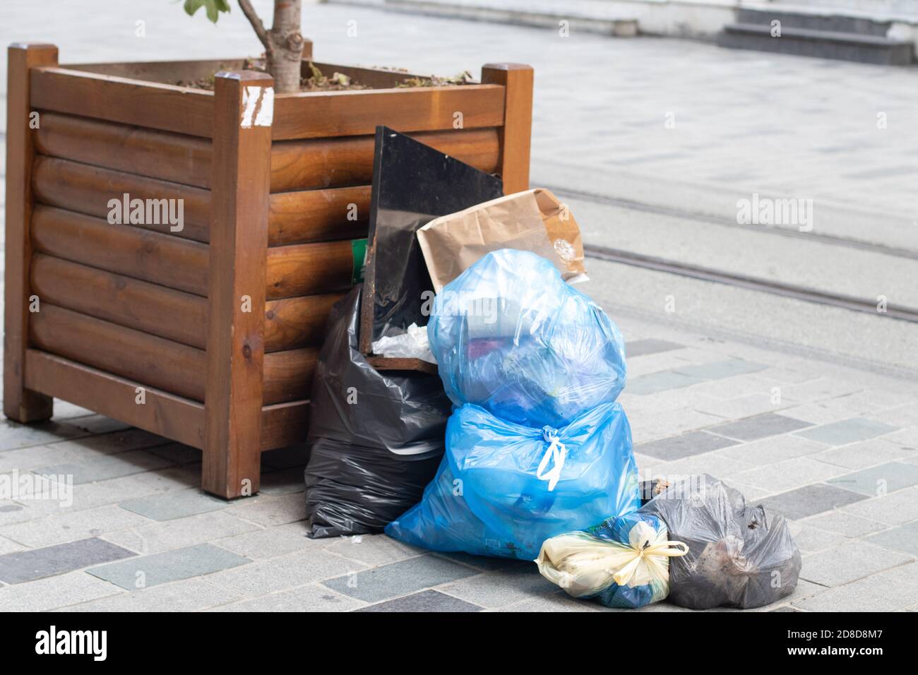 Garbage bags on the street of a european city Stock Photo