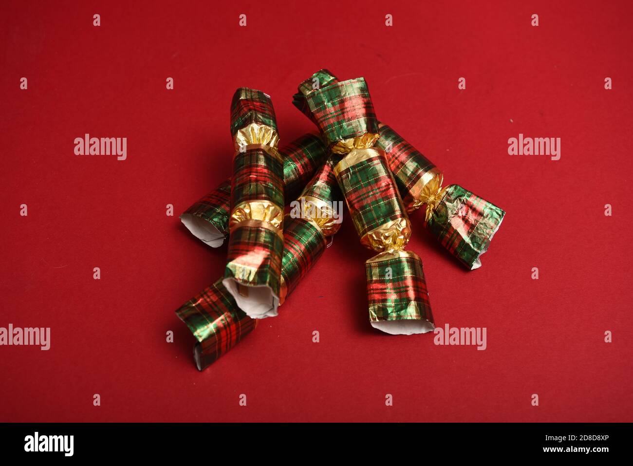 crumpled Christmas crackers Stock Photo