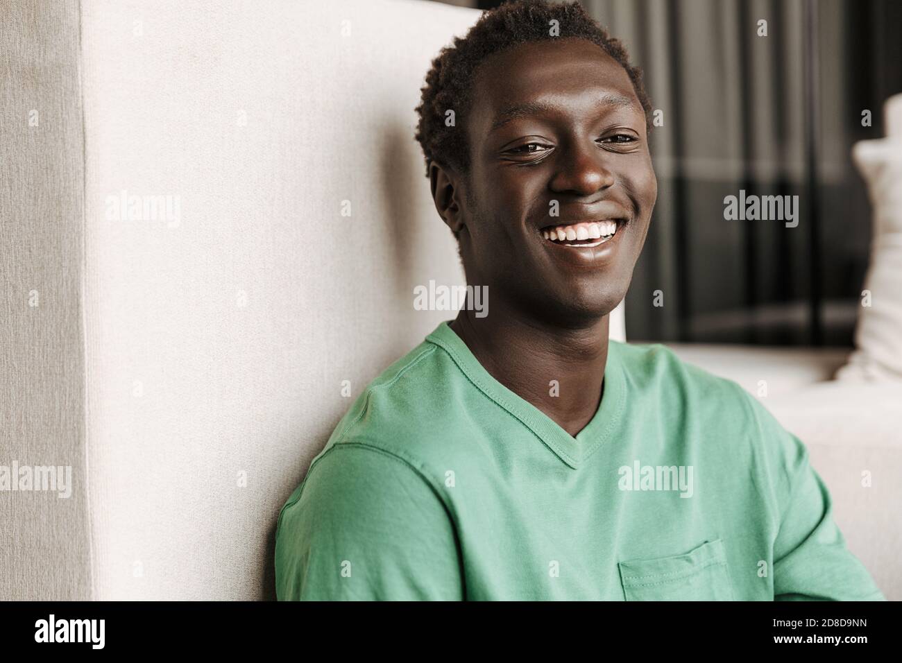Image of young joyful african american man in casual clothes smiling ...