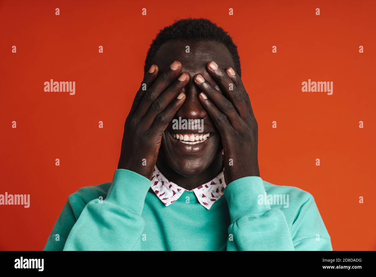 Man afro covering eyes hires stock photography and images Alamy