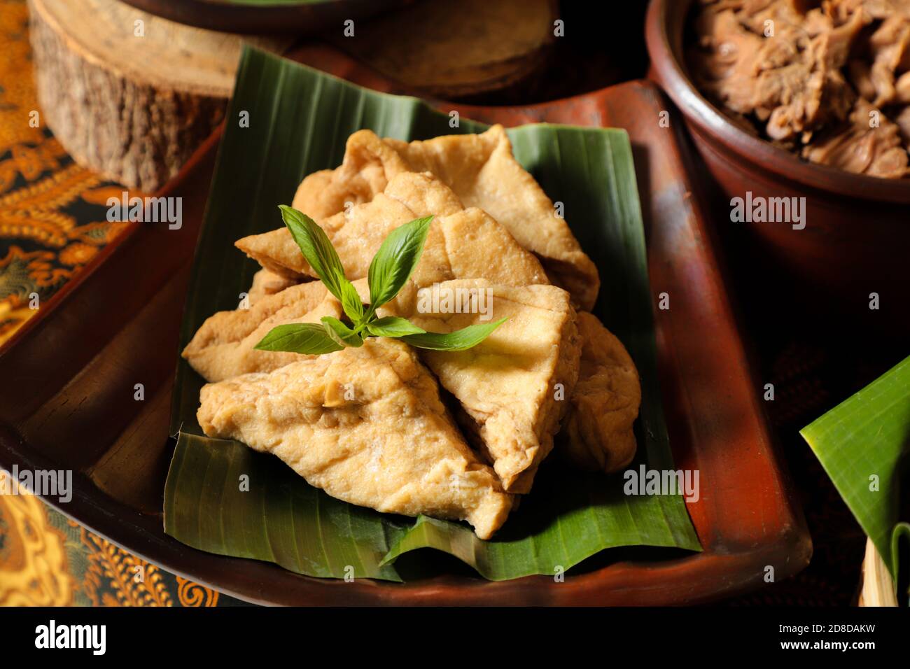 Tahu Opor. Bean curd cooked in white curry soup Stock Photo